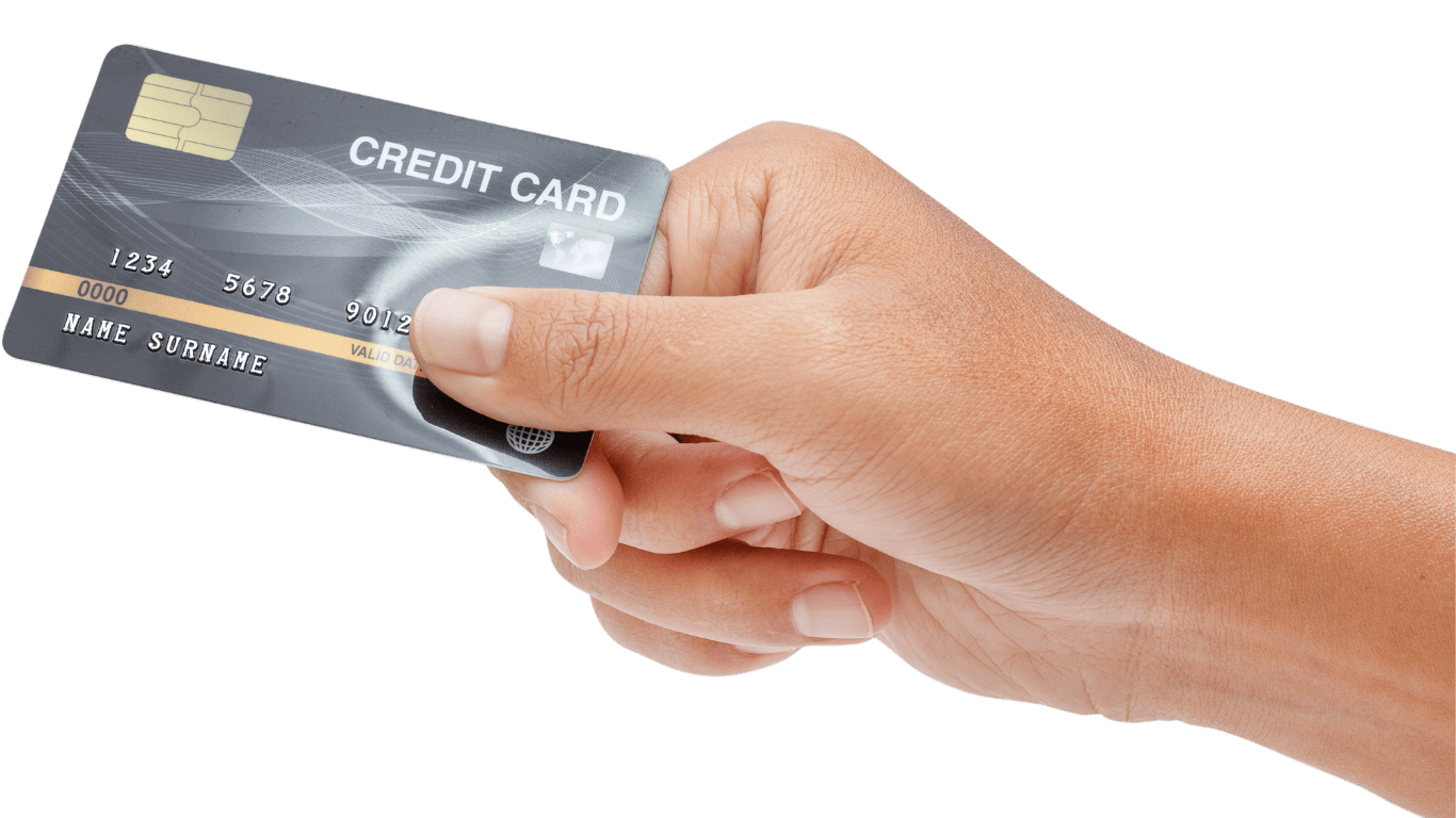 A hand holding a credit card