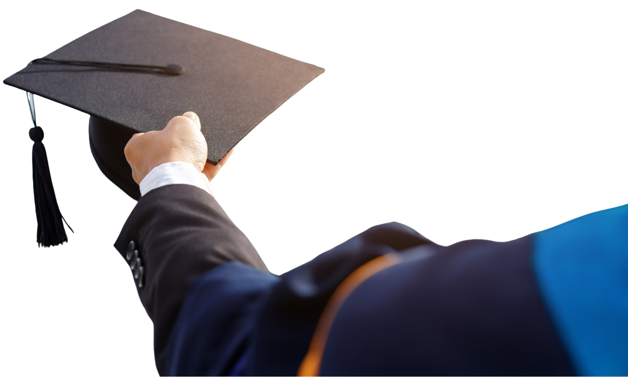 A graduate raising their cap