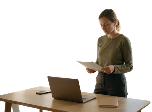 Recruiter reviewing a candidate resume while Credibled runs identity and criminal record checks